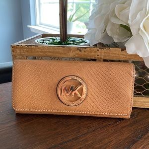 Michael Kors leather wallet.